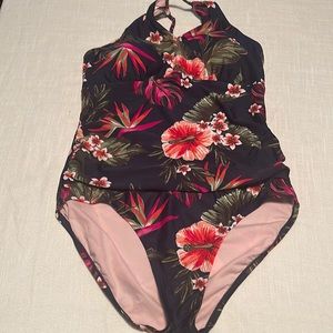 NEW. One piece size XL